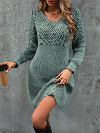 Elegant textured V-neck knit dress with bishop sleeves and soft A-line silhouette by Vohran